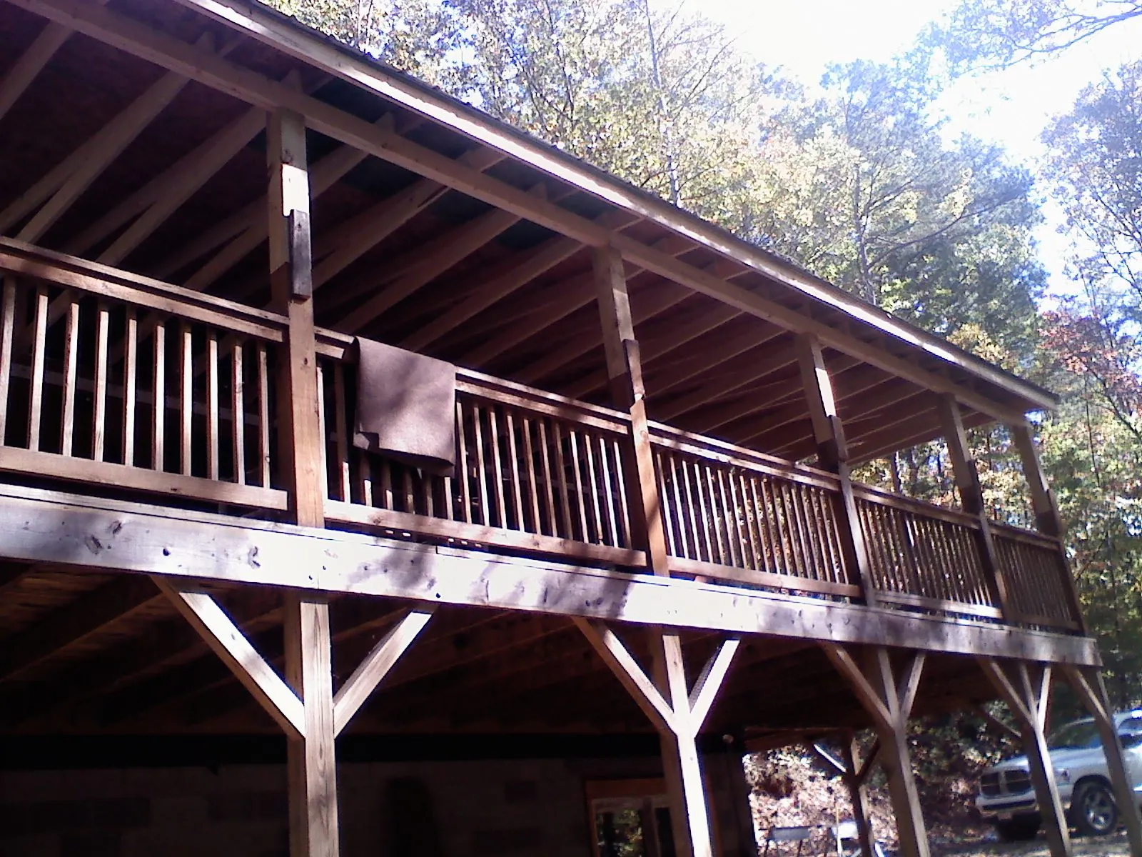 Timber framing under a new elevated porch and deck — Roof Leak Repair in Crosby by Roofing Brothers